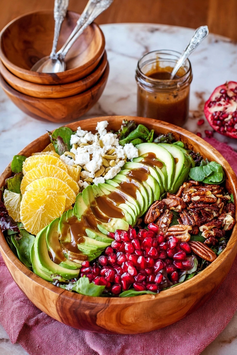 A large wooden bowl filled with a salad layered on a bed of mixed green leaves, topped with five sections of different ingredients arranged side by side. One section has white crumbly cheese with a drizzle of dark brown dressing. Next is bright yellow-orange slices of fruit, possibly citrus. The middle section contains vibrant red pomegranate seeds. Next to that are dark brown toasted pecans, and lastly, light green avocado slices fanned out with dark brown dressing drizzled on top. In the background, there is a stack of wooden bowls with silver utensils and a jar of dark brown dressing with a spoon inside, placed on a white marbled surface. Photo taken with an iphone --ar 2:3 --v 7
