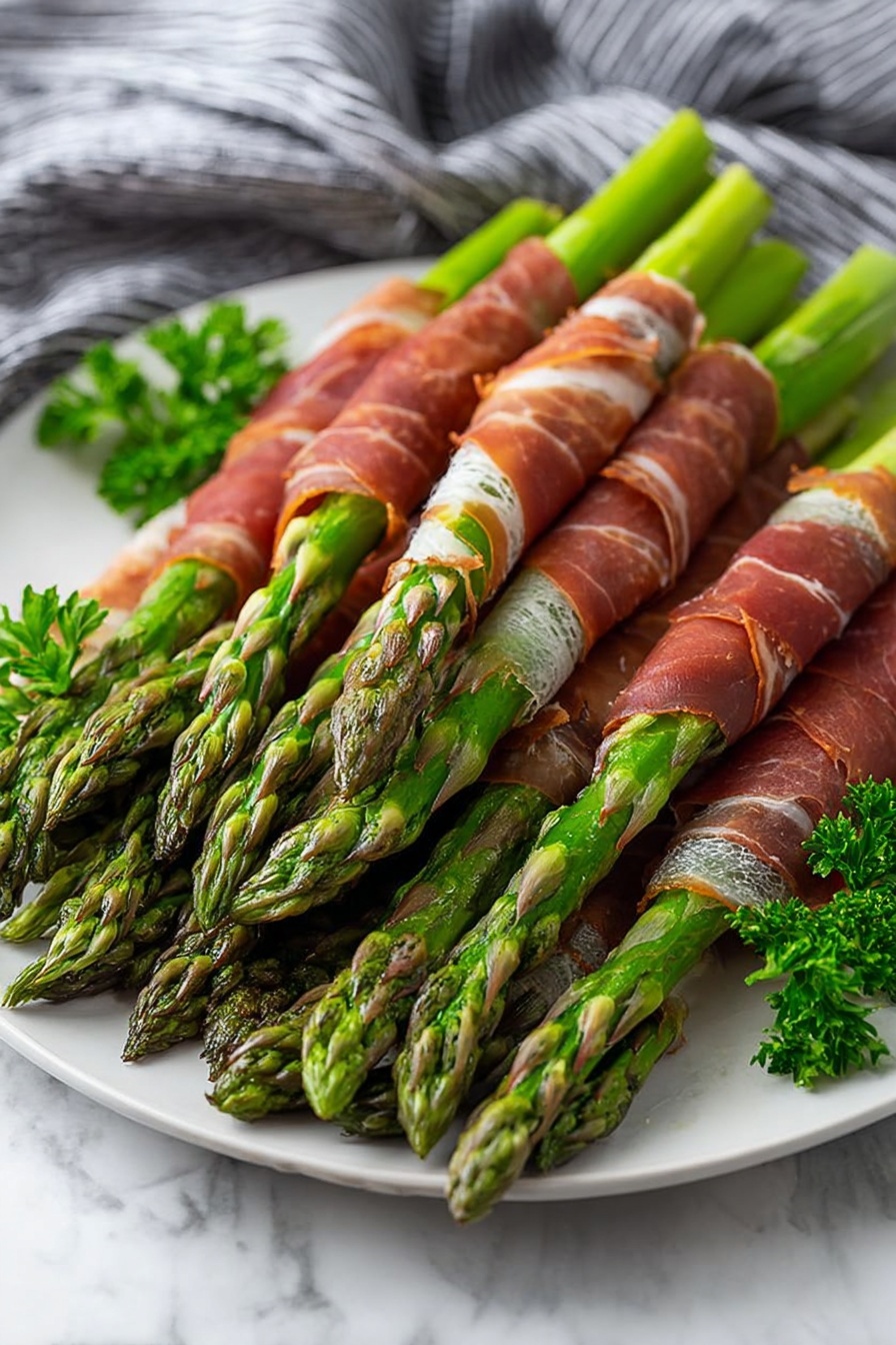 A white plate holds a neat pile of vibrant green asparagus spears wrapped tightly in thin, slightly shiny, reddish-brown slices of cured meat, showing a mix of smooth and slightly wrinkled textures. The asparagus tips are bright green with a delicate, slightly pointed texture, extending from the bottom left to the top right of the plate. Small sprigs of fresh green parsley decorate the edges of the plate, adding a pop of color and softness. The plate is set on a white marbled surface with a blurred dark and light striped cloth in the background. Photo taken with an iphone --ar 2:3 --v 7