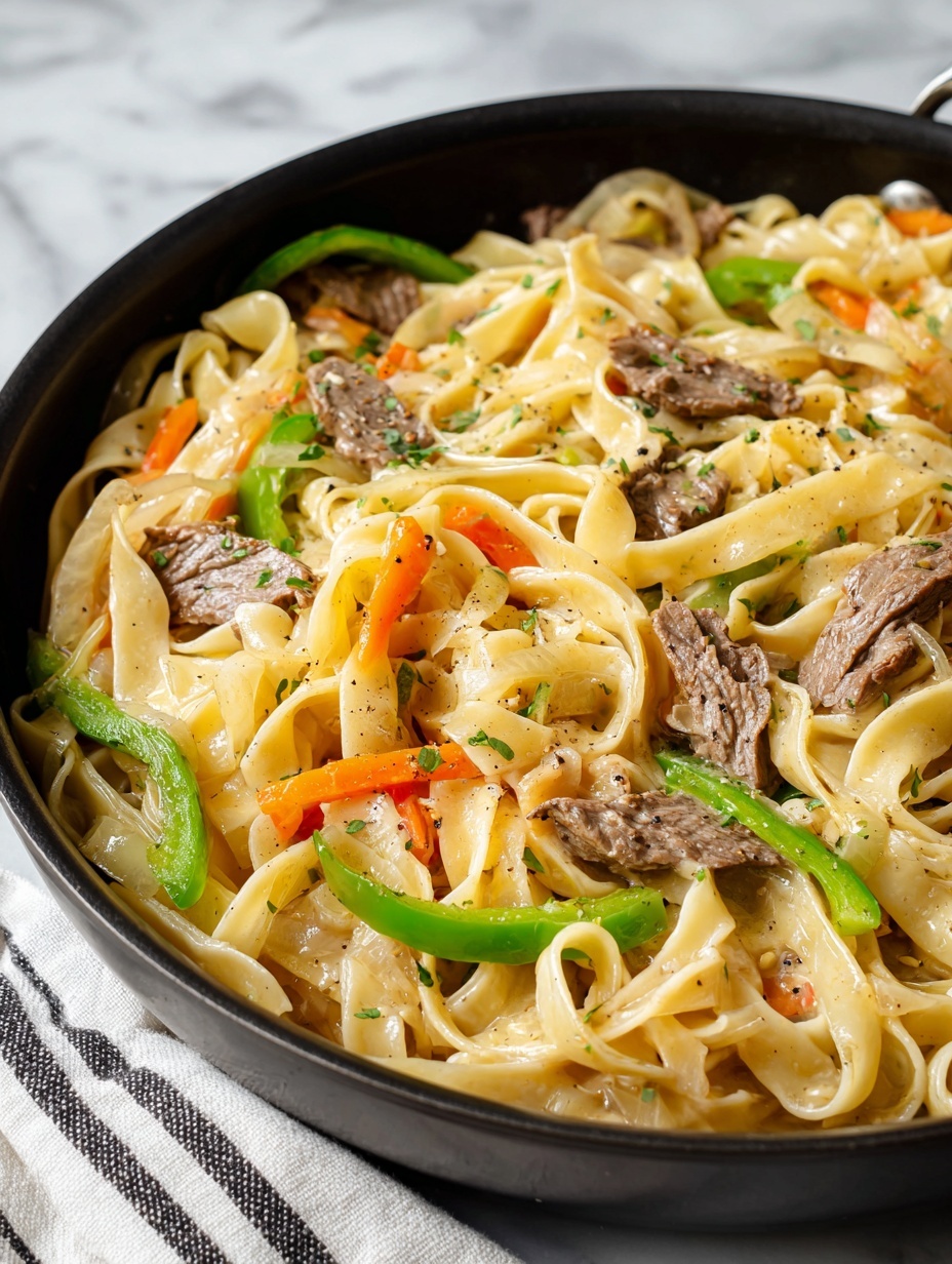 The dish shows three main layers in a black pan: the bottom layer is wide, flat noodles in a light yellow color, soft and slightly curled; the middle layer has white creamy sauce spread over the noodles; the top layer includes browned, tender beef strips scattered with lightly cooked green bell pepper slices and translucent caramelized onion rings, all sprinkled with black pepper, creating a warm, hearty look; the pan rests on a wooden surface with a white marbled texture underneath photo taken with an iphone --ar 2:3 --v 7